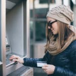 Woman at ATM Photo